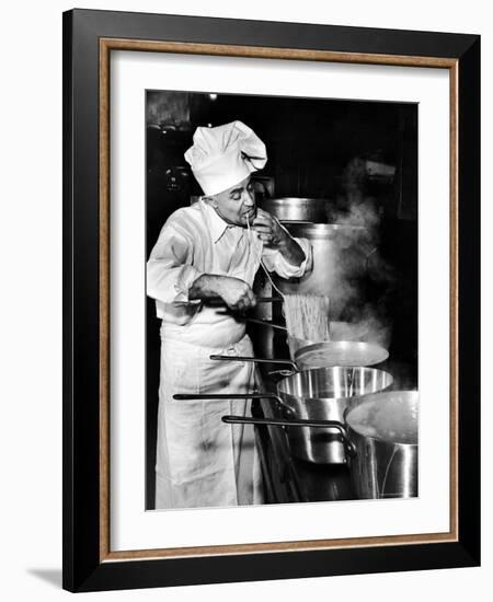 Gene Leone, Taking a Bite Test to Determine Whether the Bo Ling Spaghetti is Properly Firm-Eliot Elisofon-Framed Photographic Print