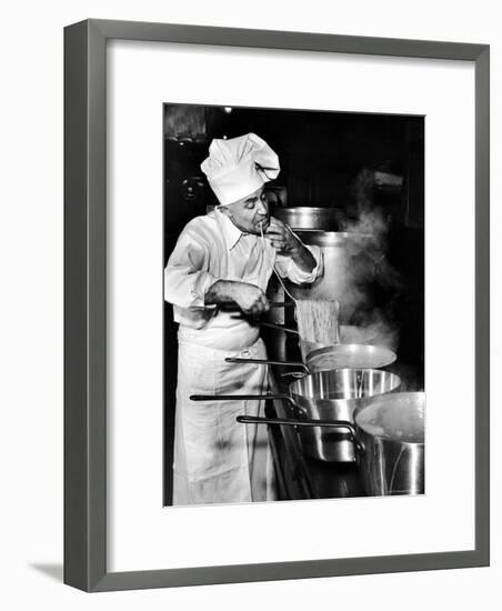 Gene Leone, Taking a Bite Test to Determine Whether the Bo Ling Spaghetti is Properly Firm-Eliot Elisofon-Framed Photographic Print