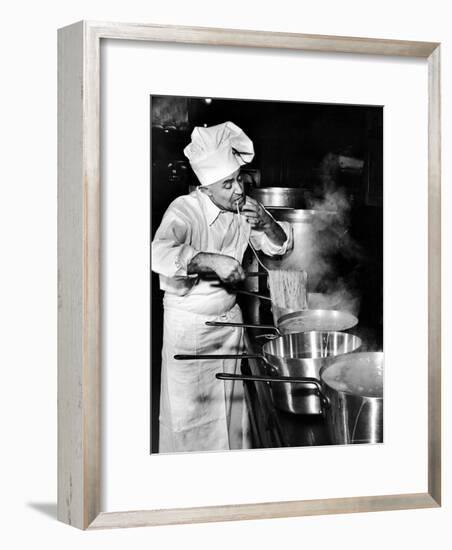 Gene Leone, Taking a Bite Test to Determine Whether the Bo Ling Spaghetti is Properly Firm-Eliot Elisofon-Framed Photographic Print