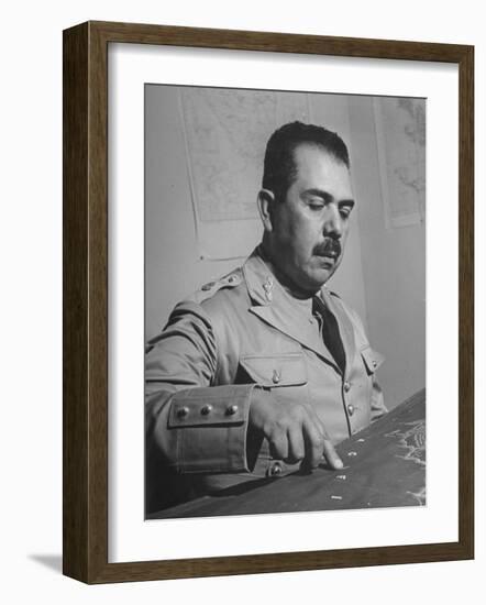 General Lazaro Cardenas, Pointing to a Map as His Continues to Work on a Stradegy-Peter Stackpole-Framed Photographic Print