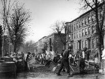 Incredibly Well Dressed Man, Woman and Child Walking by Perfect Brownstone Apartment Buildings-George B^ Brainerd-Photographic Print