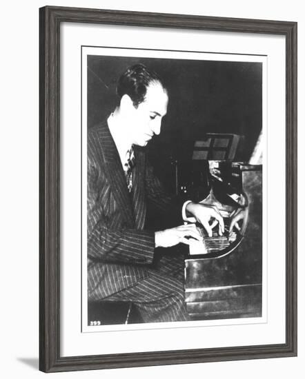 George Gershwin (1898-1937) American Composer, at the Piano, c.1935-null-Framed Photographic Print