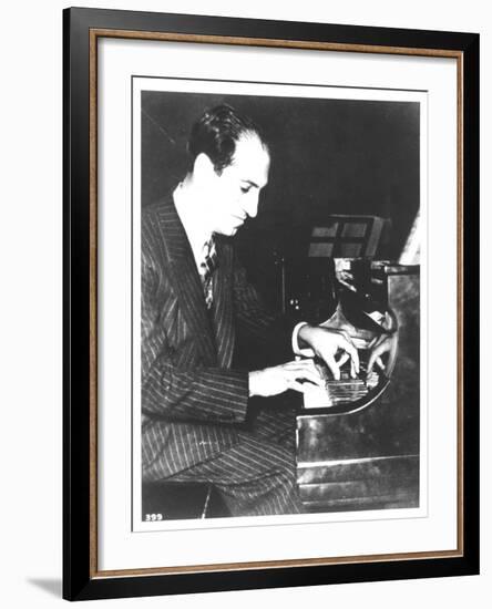 George Gershwin (1898-1937) American Composer, at the Piano, c.1935-null-Framed Photographic Print