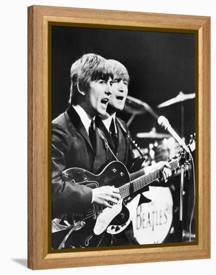 George Harrison (Left) and John Lennon of the Beatles-null-Framed Stretched Canvas