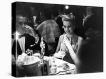 Chorus Girl-Singer Linda Lombard, Resting Her Legs after a Tough Night on Stage-George Silk-Photographic Print