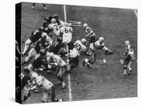 The Green Bay Packers Playing a Game-George Silk-Premier Image Canvas