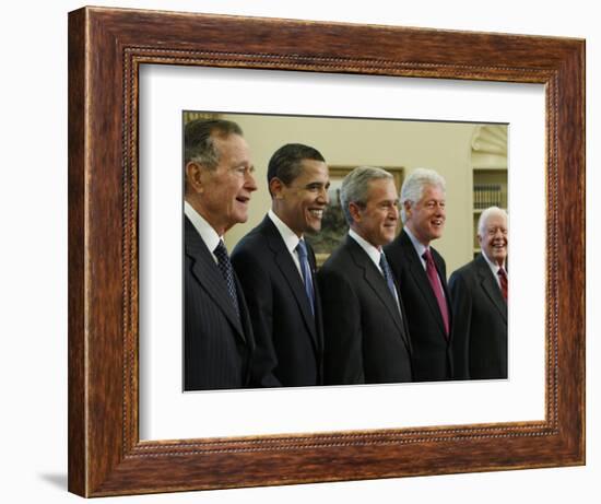 George W. Bush with Barack Obama and Former Presidents Bush, Clinton and Carter in Oval Office-null-Framed Photographic Print