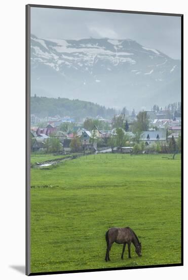 Georgia, Bakuriani. Ski resort town, view of town and mountains.-Walter Bibikow-Mounted Photographic Print