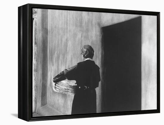 Georgia O'Keeffe Carrying a Basket-John Loengard-Framed Premier Image Canvas