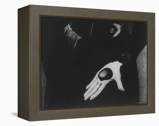 Georgia O'Keeffe Holding One of Her Favorite Stones in Her Palm-John Loengard-Framed Premier Image Canvas