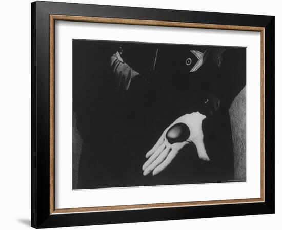 Georgia O'Keeffe Holding One of Her Favorite Stones in Her Palm-John Loengard-Framed Premium Photographic Print