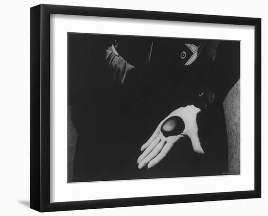 Georgia O'Keeffe Holding One of Her Favorite Stones in Her Palm-John Loengard-Framed Premium Photographic Print