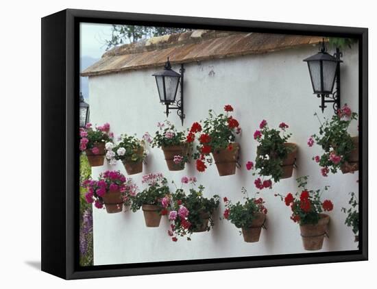 Geraniums along White Wall of Palacio de Mondragon, Ronda, Spain-Merrill Images-Framed Premier Image Canvas