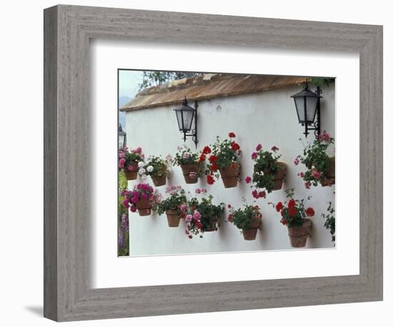 Geraniums along White Wall of Palacio de Mondragon, Ronda, Spain-Merrill Images-Framed Photographic Print