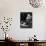 German Born Novelist Thomas Mann Sitting in Armchair at Home, Smoking Cigar and Reading a Book-Carl Mydans-Framed Premier Image Canvas displayed on a wall