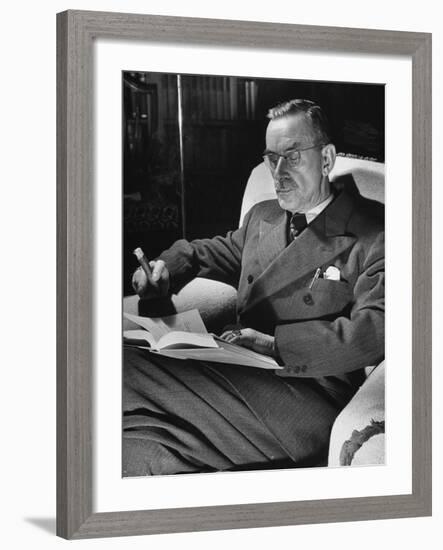 German-Born Writer Thomas Mann Reading a Book at Home-Carl Mydans-Framed Premium Photographic Print