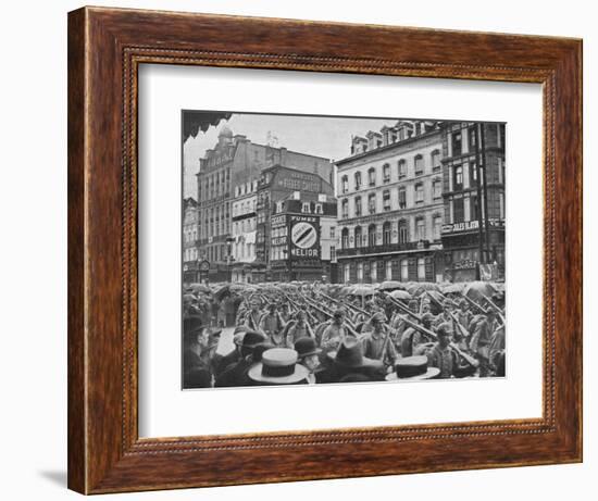 'German infantry entering Brussels in the rain', 1914-Unknown-Framed Photographic Print