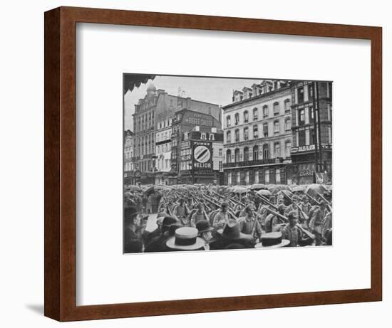 'German infantry entering Brussels in the rain', 1914-Unknown-Framed Photographic Print