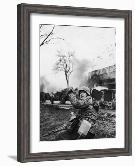 German Soldier Urging Comrades Forward During the Battle of the Bulge-null-Framed Photographic Print