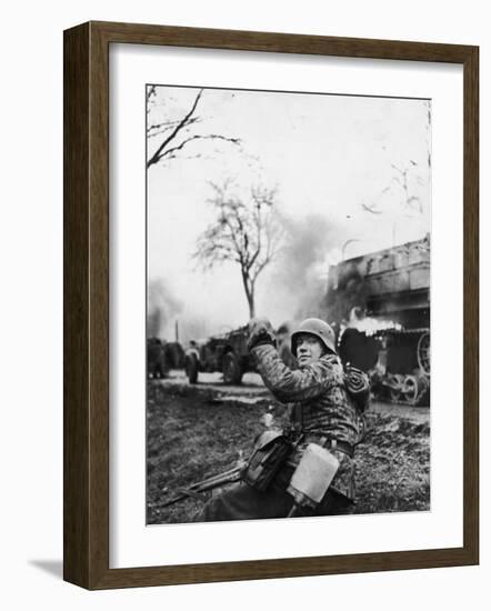 German Soldier Urging Comrades Forward During the Battle of the Bulge-null-Framed Photographic Print