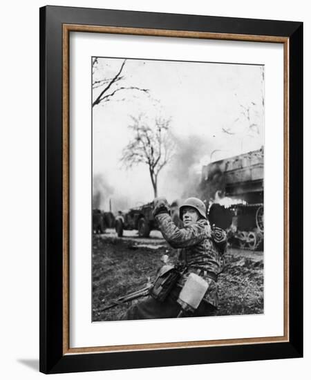 German Soldier Urging Comrades Forward During the Battle of the Bulge-null-Framed Photographic Print