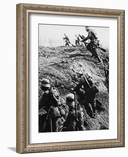 German Soldiers Attacking Out of a Trench During World War I-Robert Hunt-Framed Photographic Print