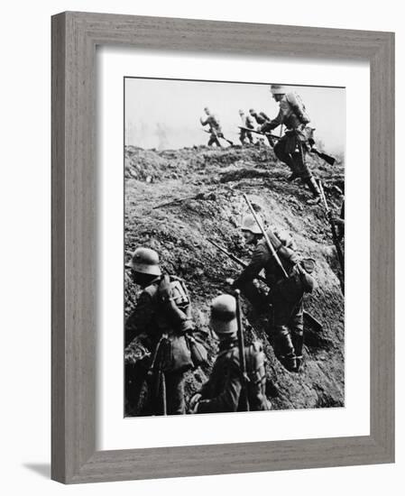 German Soldiers Attacking Out of a Trench During World War I-Robert Hunt-Framed Photographic Print