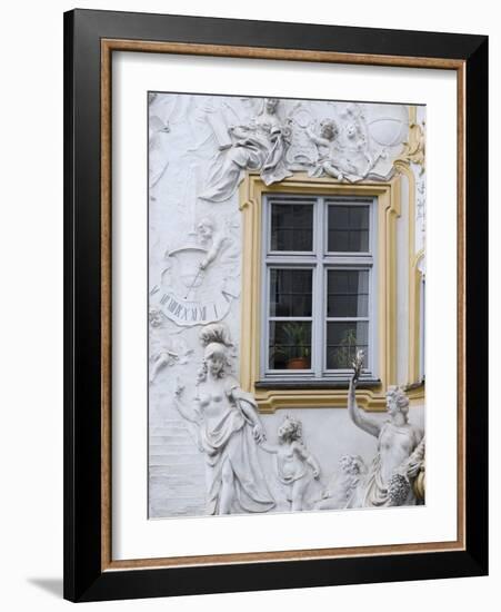 Germany, Bavaria, Munich, Ornate Stucco or Plasterwork Adorning the Front of a House in the City-John Warburton-lee-Framed Photographic Print