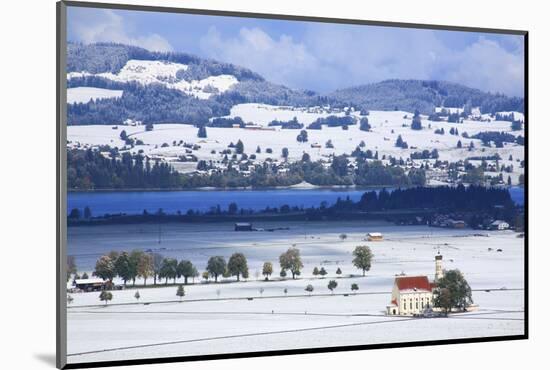 Germany, Bavaria, the Snow-Covered Schwangau with Church of Saint Coloman and 'Forggensee' (Lake)-Uwe Steffens-Mounted Photographic Print