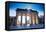 Germany, Berlin. Cyclists Passing under the Brandenburg Gate-Ken Scicluna-Framed Premier Image Canvas