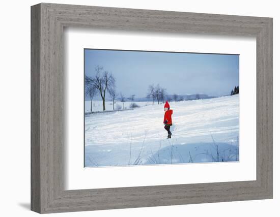 Germany - Bielefeld - 1960's Child Plays in Snow-Richard Baker-Framed Photographic Print