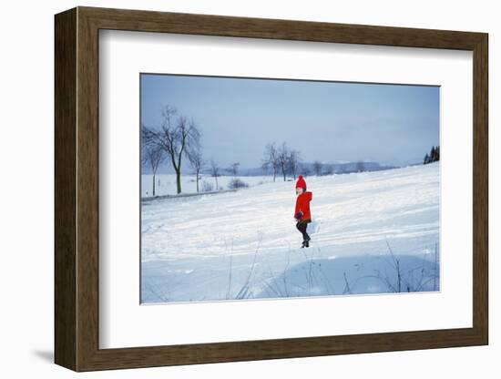 Germany - Bielefeld - 1960's Child Plays in Snow-Richard Baker-Framed Photographic Print