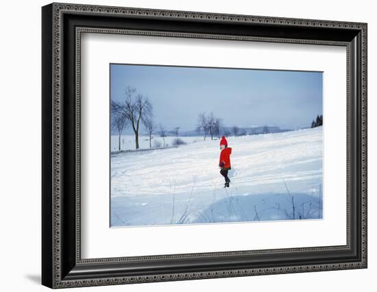 Germany - Bielefeld - 1960's Child Plays in Snow-Richard Baker-Framed Photographic Print