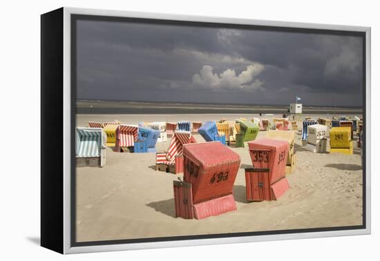 Germany, Lower Saxony, Island Langeoog, Beach, Wicker Beach Chairs-Roland T.-Framed Premier Image Canvas