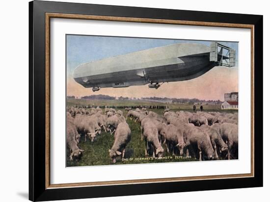 Germany - View of a Zeppelin Blimp over Grazing Sheep-Lantern Press-Framed Art Print