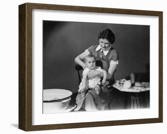 Getting Baby Ready for His Bath-null-Framed Photographic Print