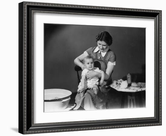 Getting Baby Ready for His Bath-null-Framed Photographic Print