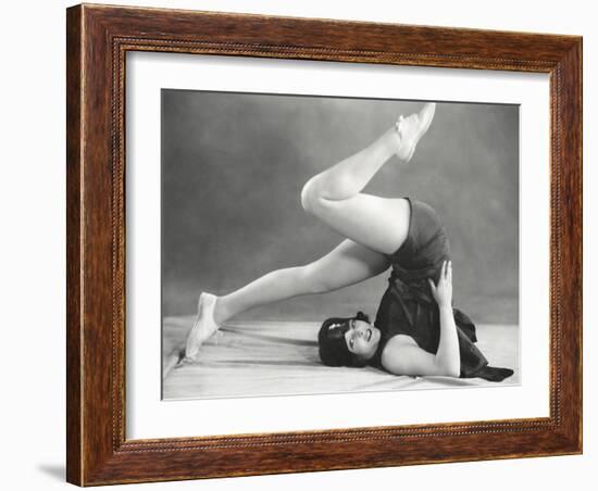 Getting into the Yoga Plow Pose-null-Framed Photo