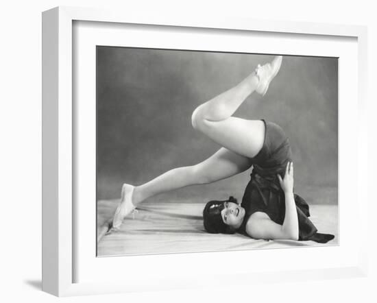 Getting into the Yoga Plow Pose-null-Framed Photo