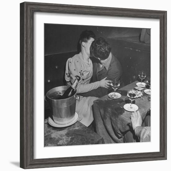 GI Kissing His Lady Friend After a Glass of Champagne-Ed Clark-Framed Photographic Print