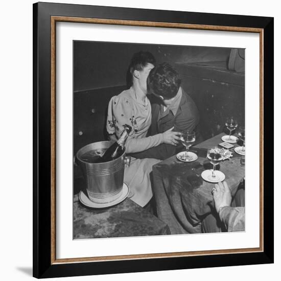 GI Kissing His Lady Friend After a Glass of Champagne-Ed Clark-Framed Photographic Print