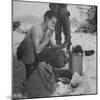 GI shaving with mirror during ull in the Ardennes Forest Conflict called the Battle of the Bulge-John Florea-Mounted Photographic Print