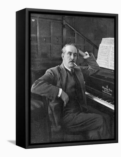 Giacomo Puccini Leans on the Pianoa Cigarette Dangling from the Side of His Mouth-G^ Magrini-Framed Premier Image Canvas