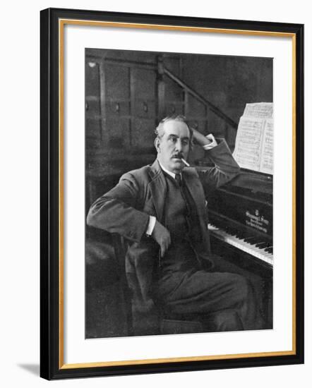 Giacomo Puccini Leans on the Pianoa Cigarette Dangling from the Side of His Mouth-G^ Magrini-Framed Photographic Print