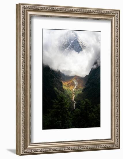 Giant mountain emerging through the clouds in the Himalayas, Nepal on the way to Everest Base Camp-David Chang-Framed Photographic Print