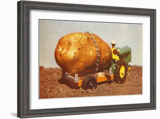 Giant Potato on Toy Tractor-null-Framed Art Print