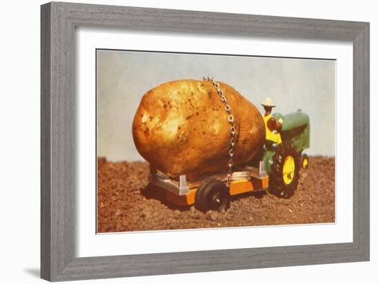 Giant Potato on Toy Tractor-null-Framed Art Print