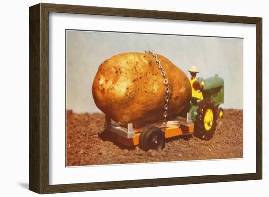 Giant Potato on Toy Tractor-null-Framed Art Print