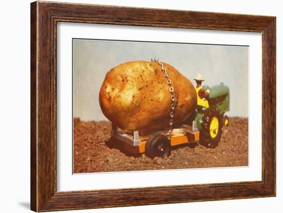 Giant Potato on Toy Tractor-null-Framed Art Print