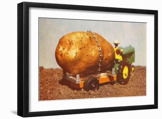 Giant Potato on Toy Tractor-null-Framed Art Print